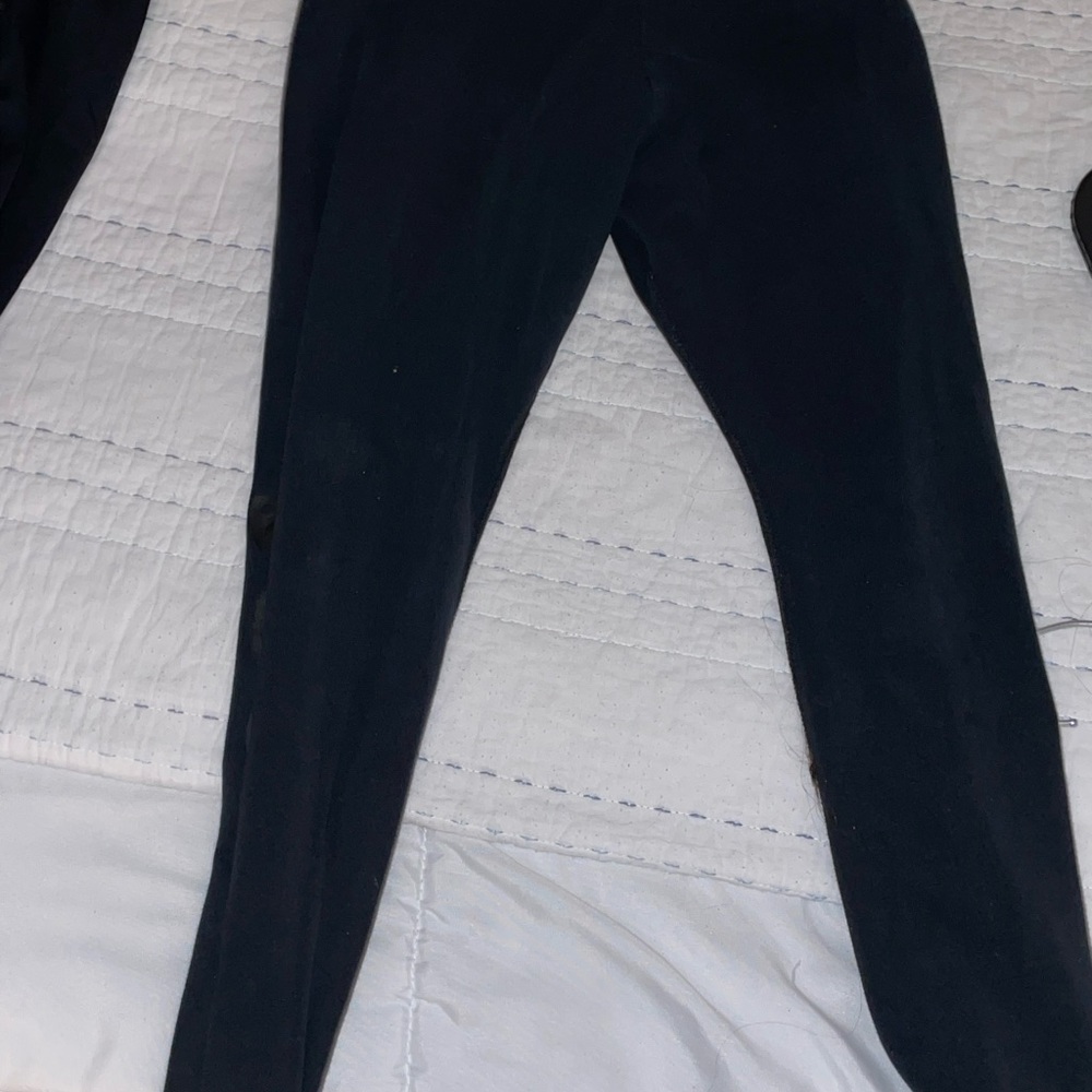 Nike Black Leggings with black writing “just do it” on bottom pant leg